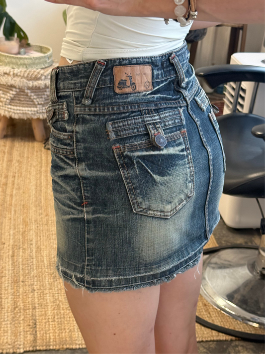 DISTRESSED DENIM MINI SKIRT